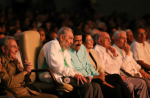 Cuba's former president Fidel Castro (2nd L) and Venezuela's President Nicolas Maduro (3rd L), talk next to Cuba's President Raul Castro (L) during a cultural gala to celebrate Fidel Castro's 90th birthday in Havana, Cuba August 13, 2016. Miraflores Palace/Handout via REUTERS ATTENTION EDITORS - THIS PICTURE WAS PROVIDED BY A THIRD PARTY. EDITORIAL USE ONLY.