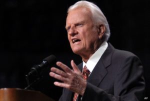 The Rev. Billy Graham preaches to the audience at the Ford Center Sunday, June 15, 2003, in Oklahoma City. (AP Photo/Jeffrey Haderthauer)